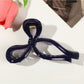 Beau - Large Hollow Out Bow Style Claw Clip