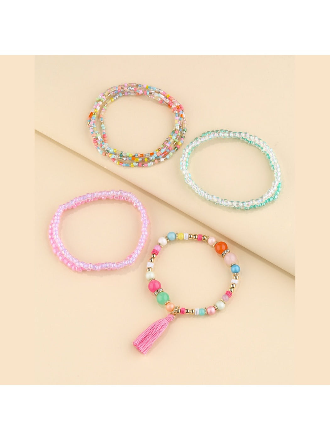 Side view of Lovra multi strand beaded bracelet highlighting bead texture and clasp