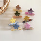Side view of Beau acetate flower hair clip highlighting the clip mechanism
