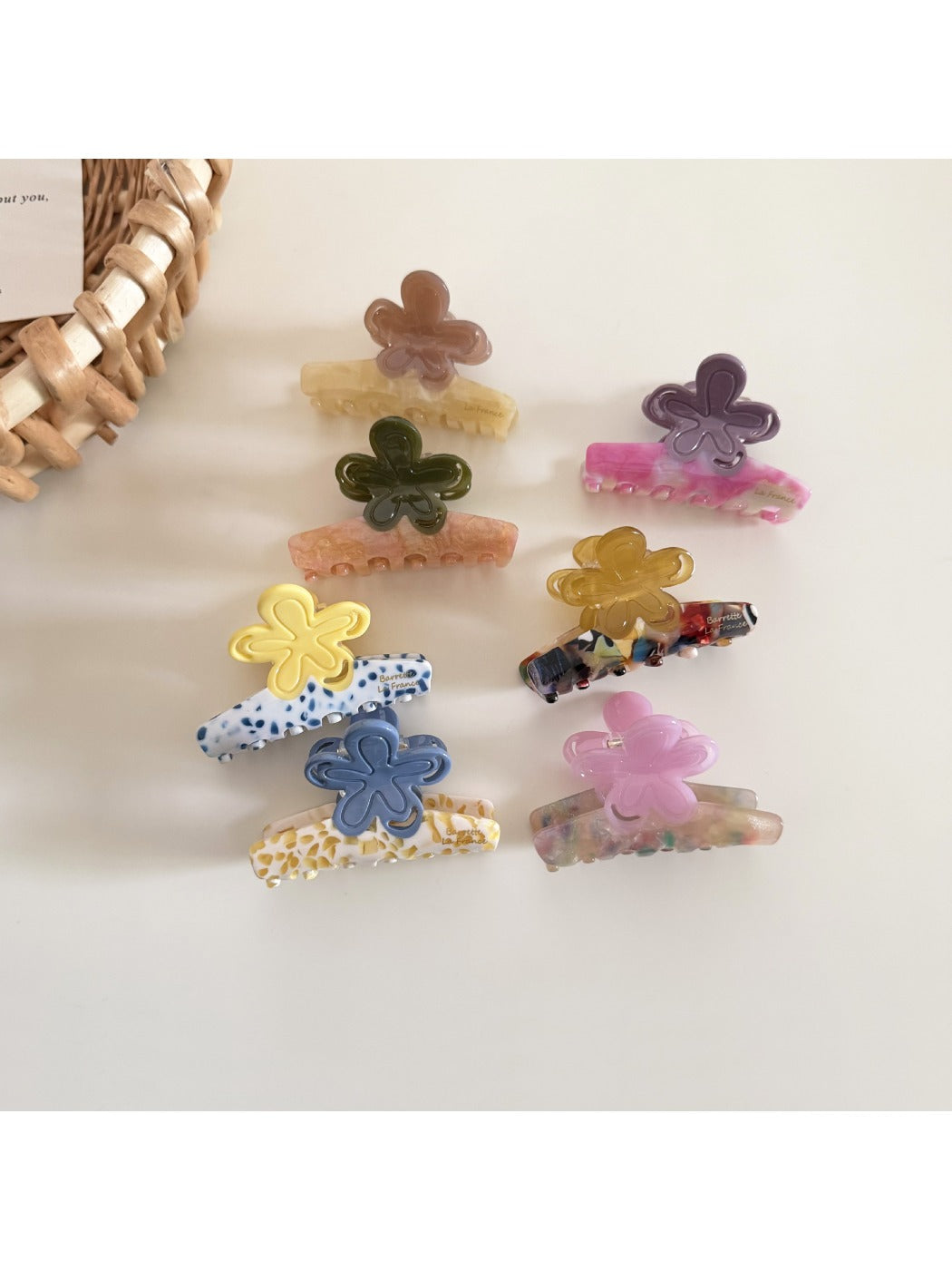 Side view of Beau acetate flower hair clip highlighting the clip mechanism