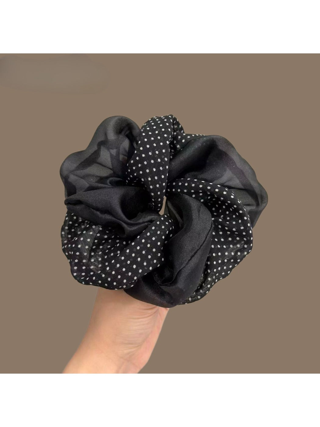 Vintage polka dot tulle scrunchie displayed on a white background showing full circular shape