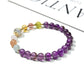 Side view of Lovra minimalist amethyst beaded bracelet highlighting bead texture