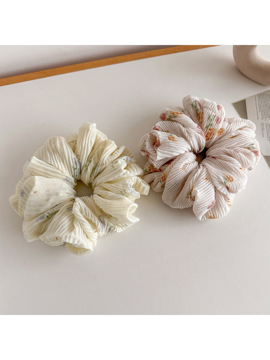 Side view of Gifty printed scrunchie showing gathered fabric texture