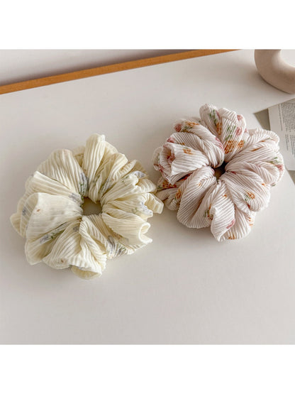 Side view of Gifty printed scrunchie showing gathered fabric texture