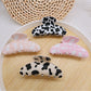 Beau leopard print claw clip on white background showing full clip design