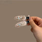 Side view of Beau hair clip with heart decoration and metal clip mechanism