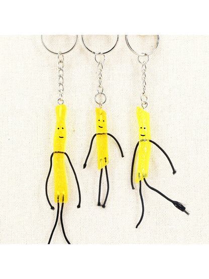 Close-up of mini French fries keychain showing detailed fries and red container