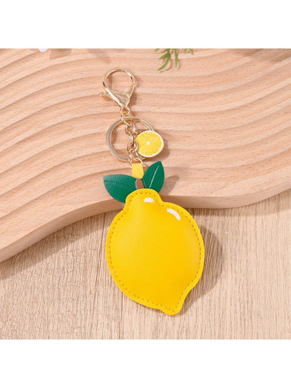 Close-up of lemon keychain showing textured surface and attached keyring