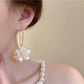 Side view of Hydrangea shaped drop earrings showing delicate flower details