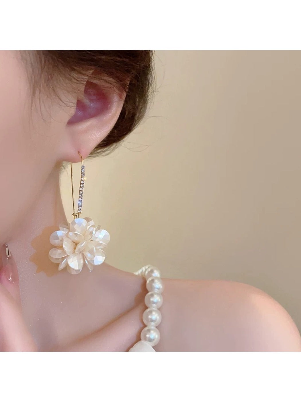 Side view of Hydrangea shaped drop earrings showing delicate flower details