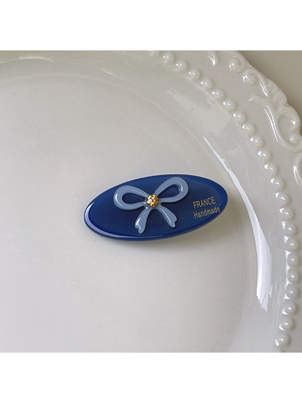 Beau hair clip shown with natural lighting emphasizing smooth texture