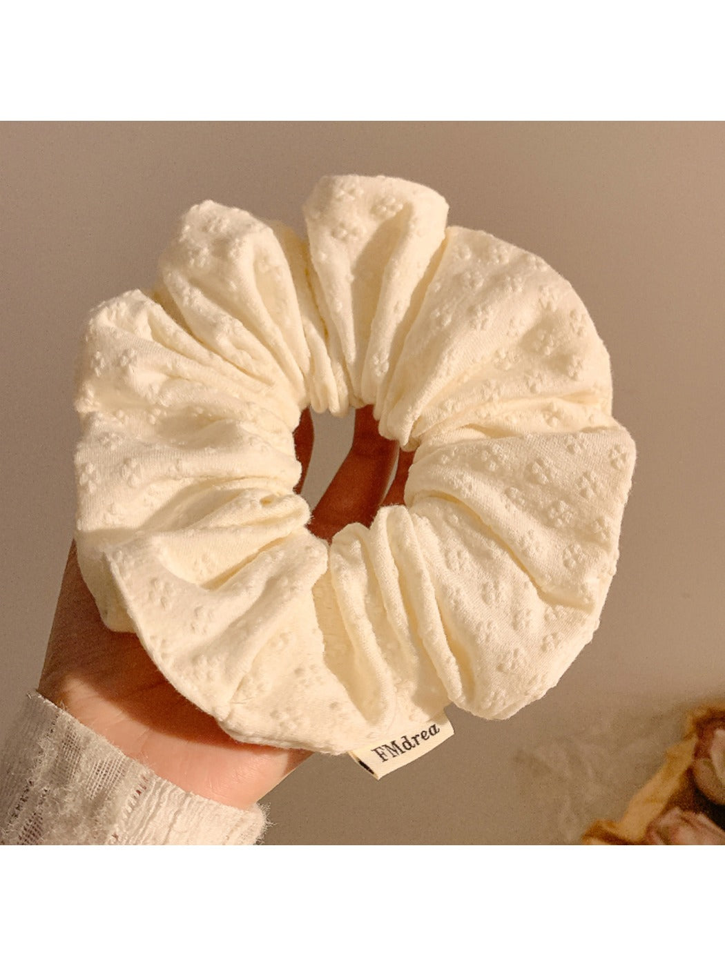Gifty minimalist floral print scrunchie packaged in a simple branded box