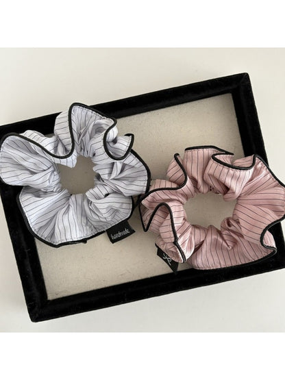 Top view of Gifty scrunchie showing soft fabric and colorful stripes
