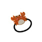 Gifty Ocean World hair tie styled in hair to showcase pattern and fit