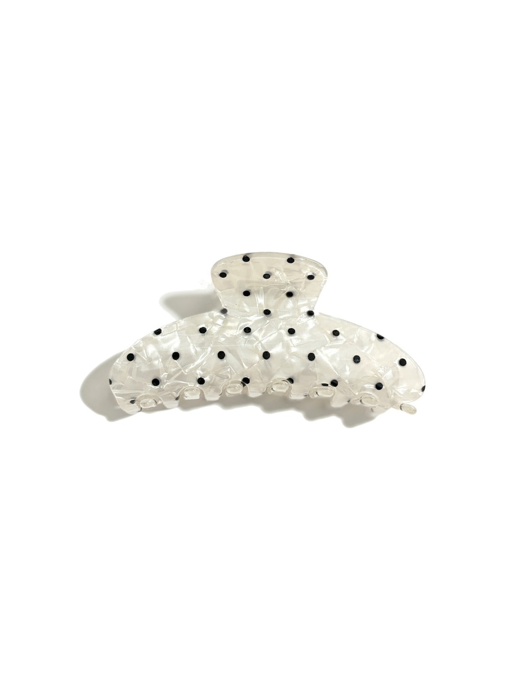 Beau polka dot updo claw clip displayed on a white background