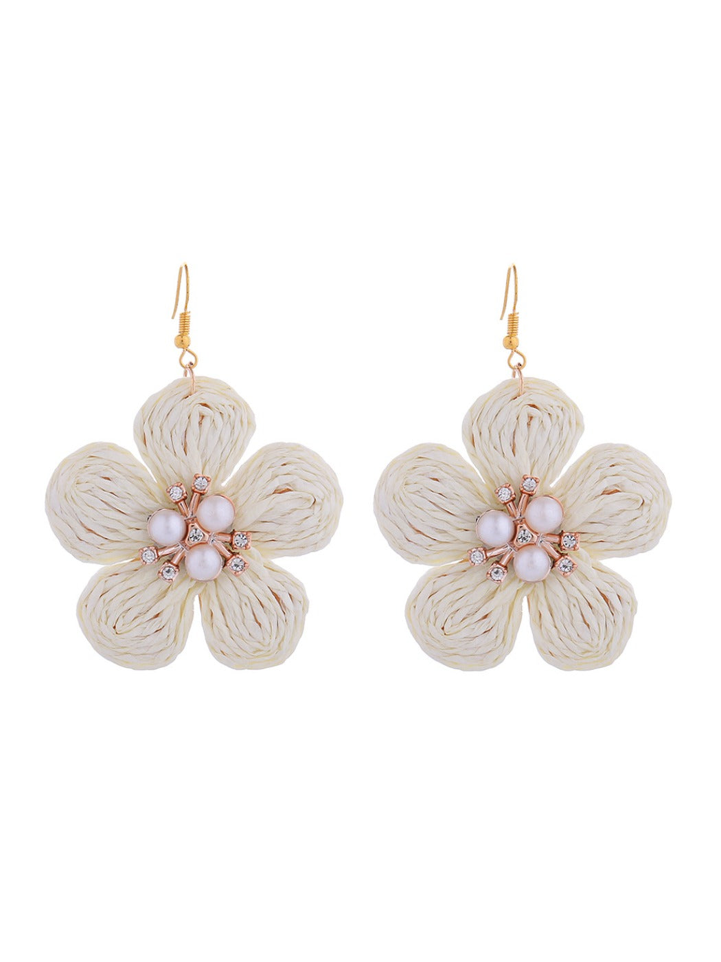 Earedge raffia flower earrings worn on a model showcasing size and natural color