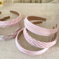 Gifty headband styled on mannequin with beige plaid and stripe design