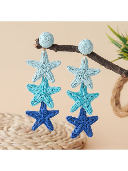 Earedge star pendant earrings packaged in a branded jewelry box