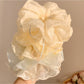 Close-up of Gifty double layer tulle scrunchie showing texture and layers