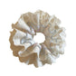 Blue lace double scrunchie styled on a wrist as a fashion accessory