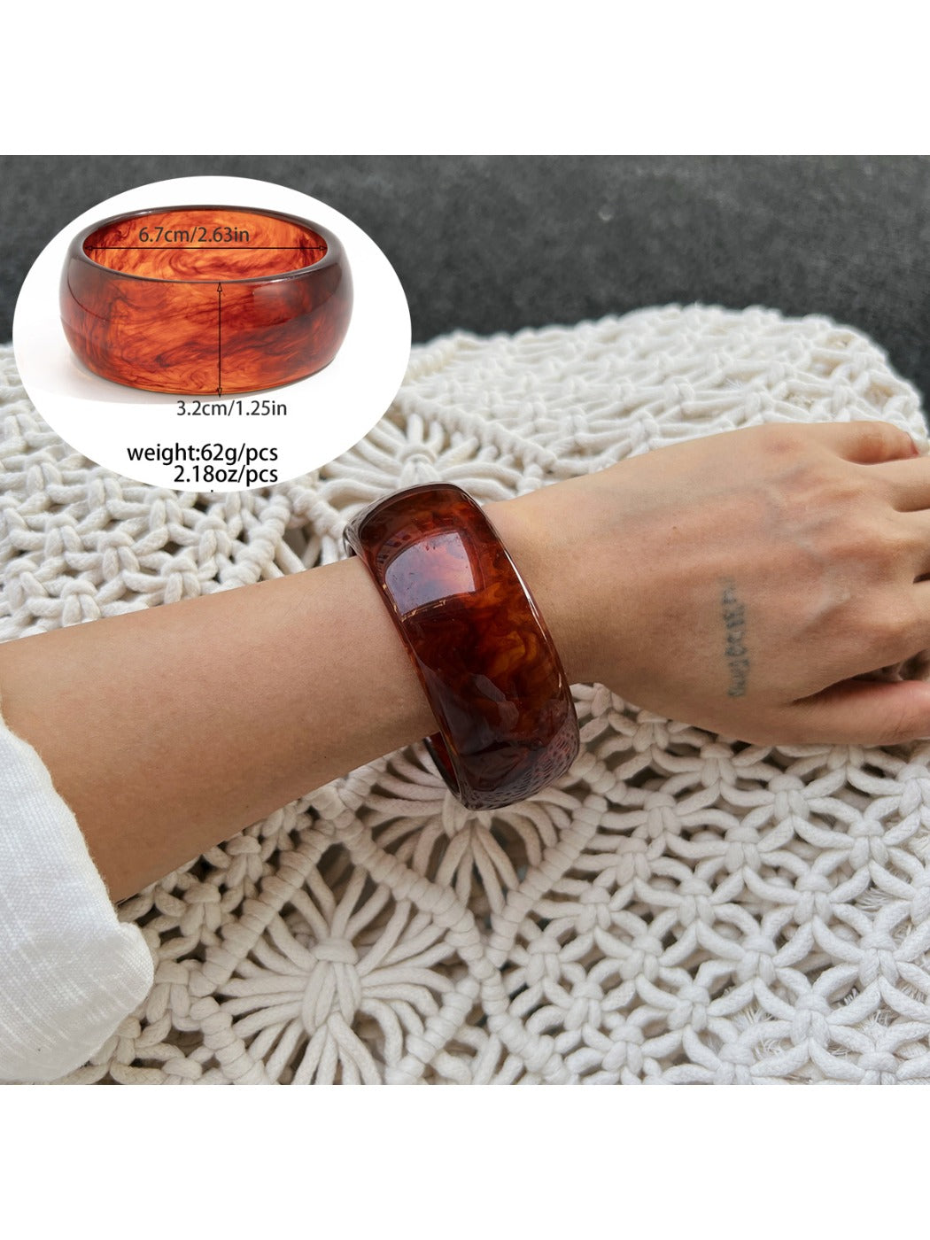 Lovra ombre bangle bracelet paired with casual outfit on model's arm