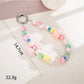 Keypus - Cartoon Acrylic Bow Star Beaded Phone Charm