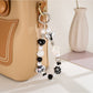 Keypus - Cartoon Acrylic Bow Star Beaded Phone Charm