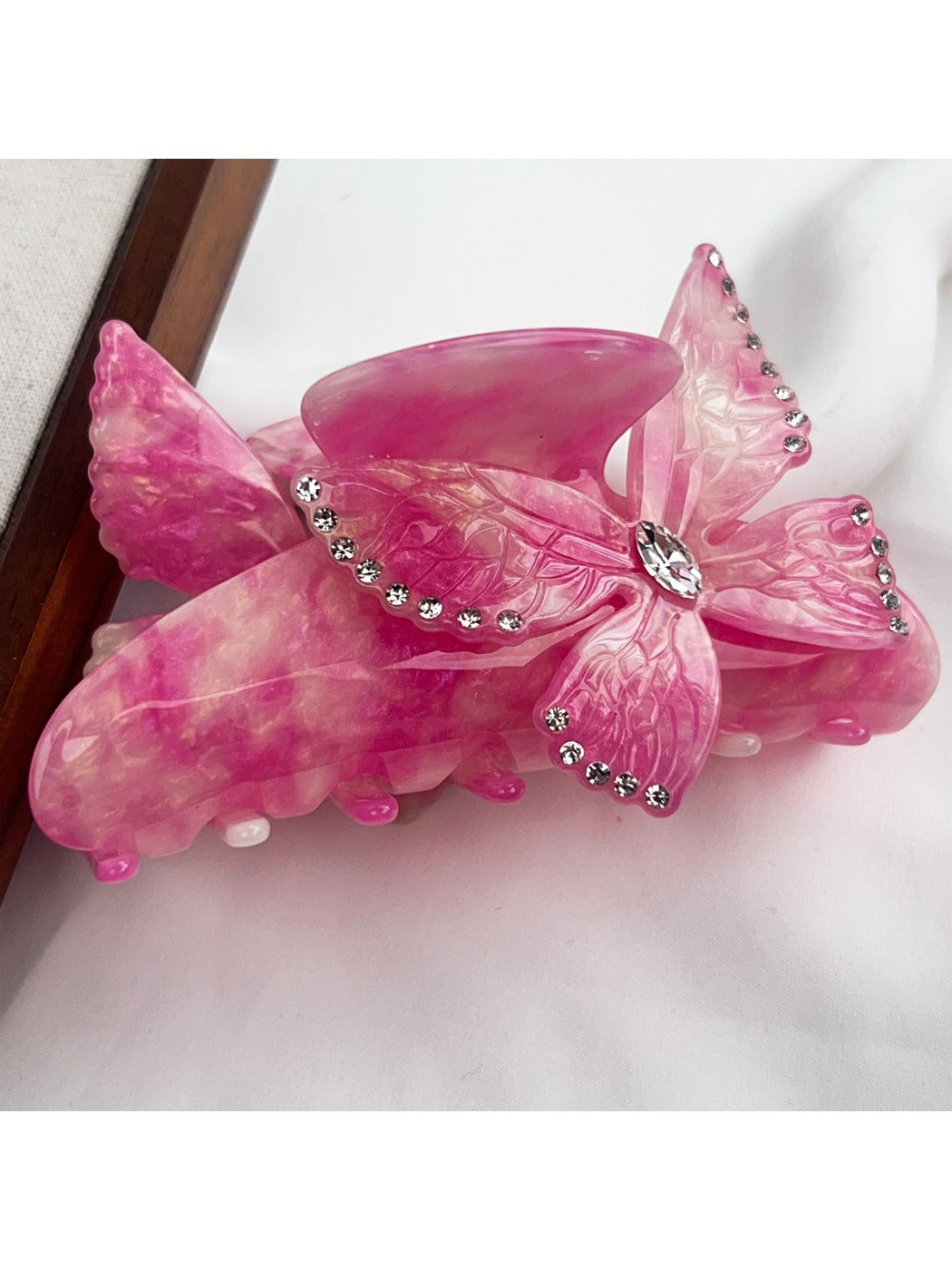 Beau colorful butterfly hair claw clip styled in long hair