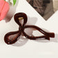 Beau - Large Hollow Out Bow Style Claw Clip