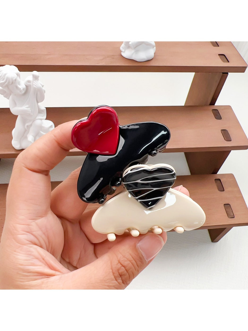 Close-up of Beau medium heart shaped half circle claw clip showing metal spring mechanism