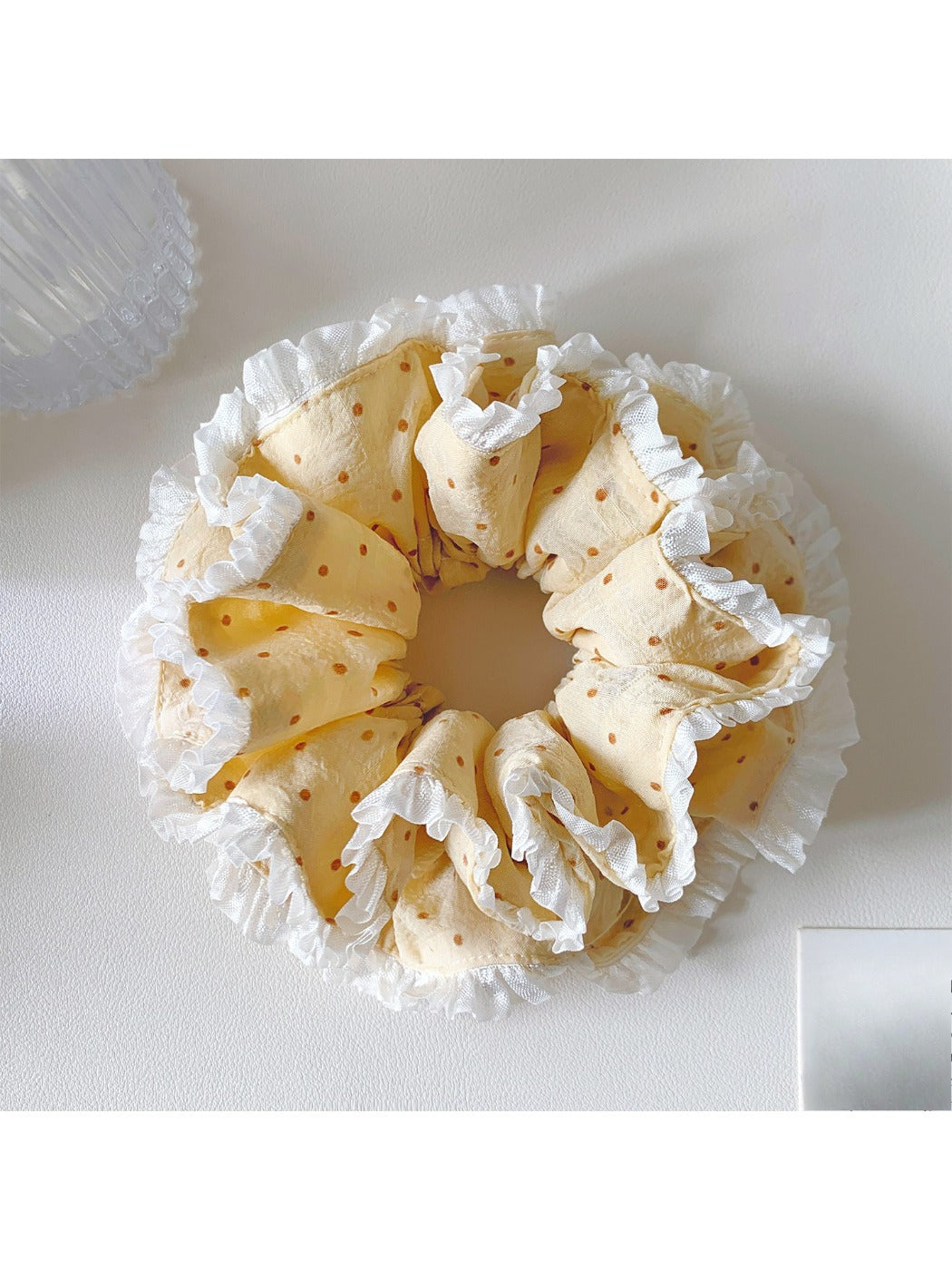 Gifty polka dot double layer lace scrunchie displayed with matching accessories
