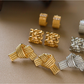 Earedge - Textured Knot Design Fashion Stud Earrings