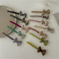 Side view of Beau minimalist bow bar hair clip highlighting curved shape and clasp