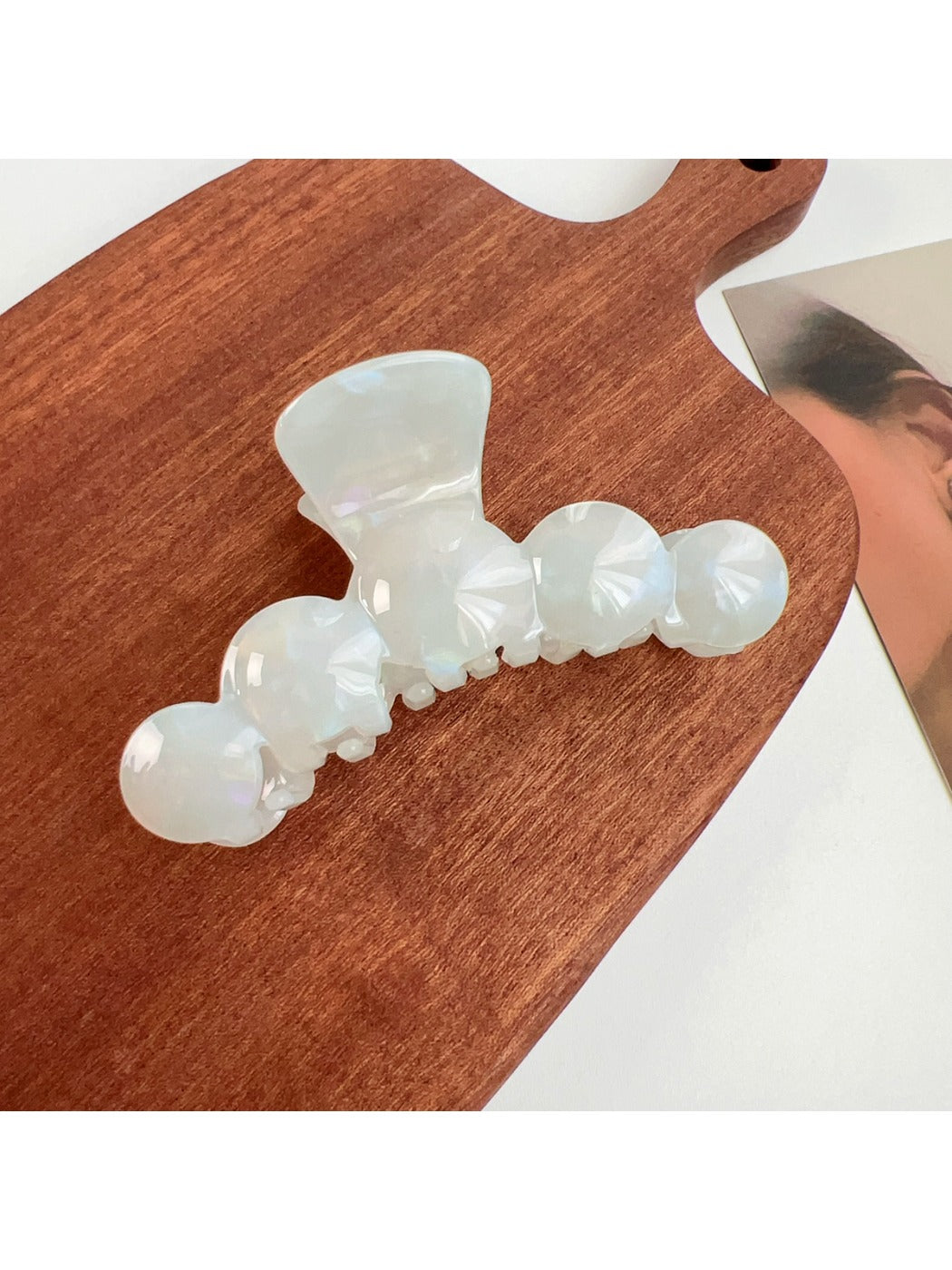 Top view of Beau hair claw clip showing symmetrical wavy pattern