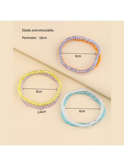 Lovra layered beaded bracelet worn on wrist showing detailed bead textures and colors