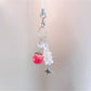 Red apple keychain displayed on a white background highlighting its compact size