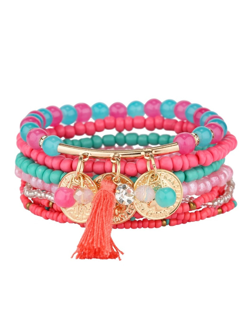 Lovra bracelet displayed with other jewelry pieces on a wooden surface