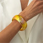 Lovra colorful bangle bracelet displayed in a jewelry box