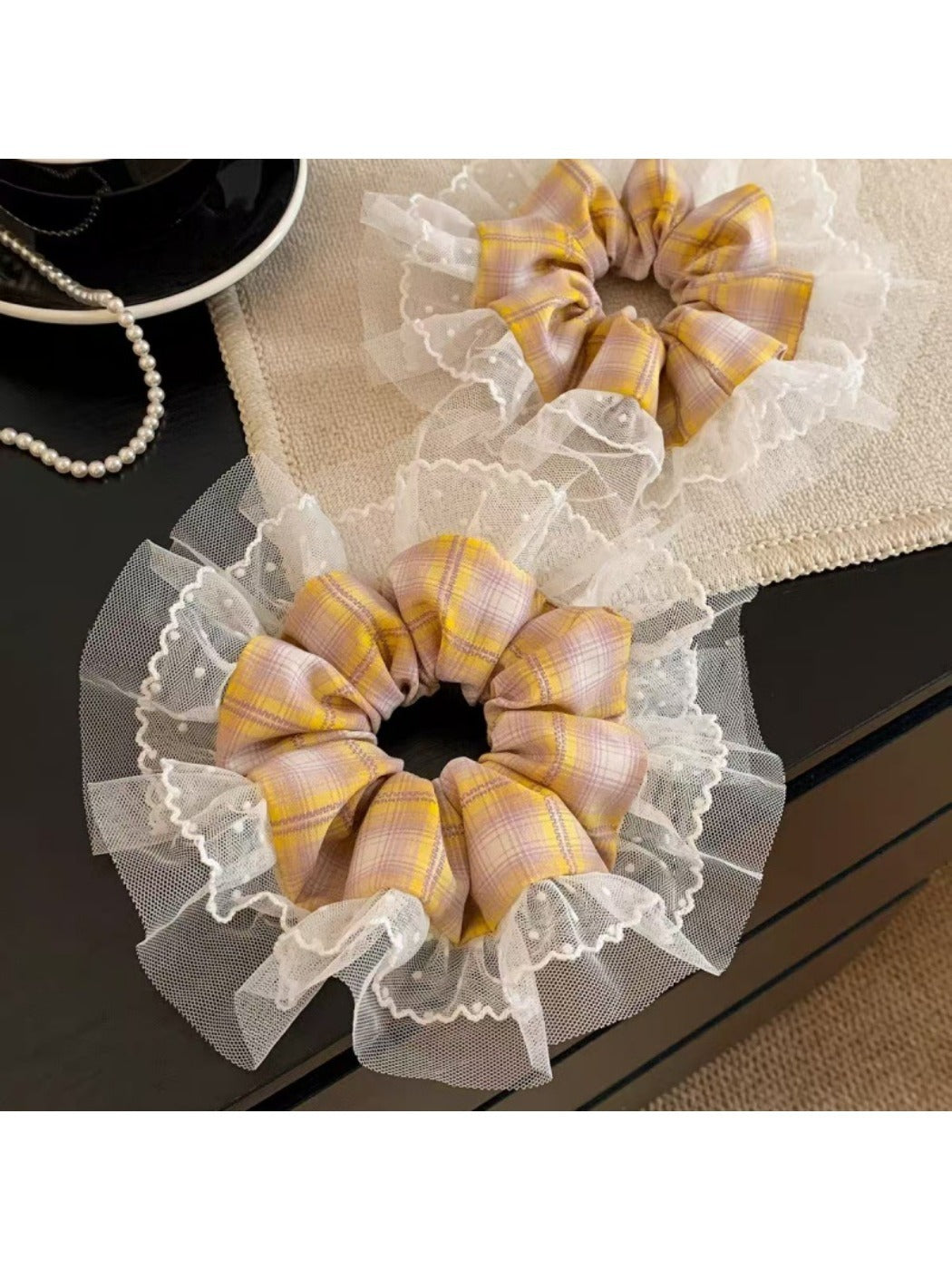 Vintage yellow plaid scrunchie displayed on a white background