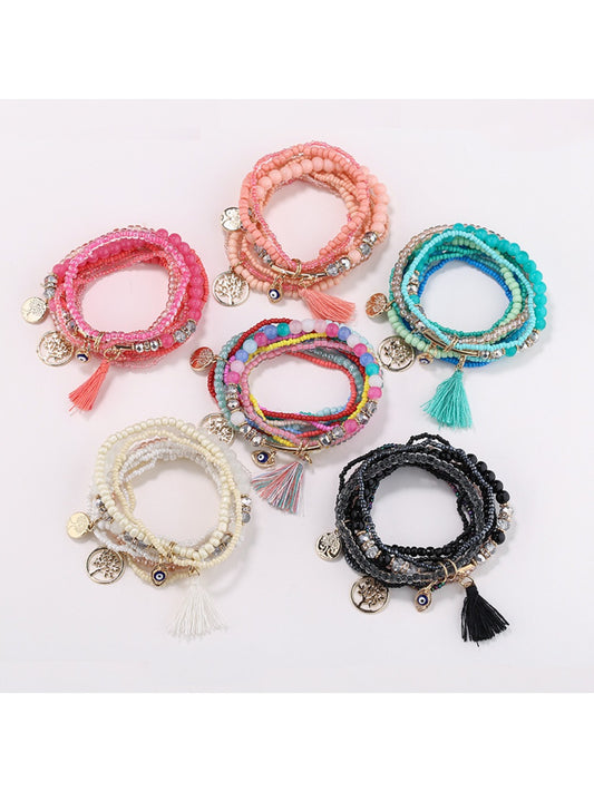 Close-up of Lovra vintage colorful multi strand beaded bracelet with various bead shapes and colors