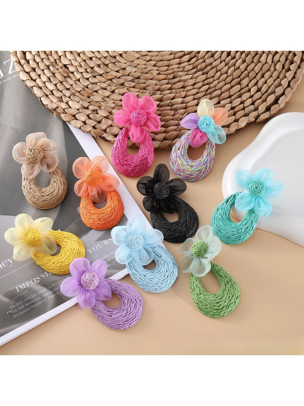 Close-up of Sweet Raffia Flower Shaped Stud Earrings on white background