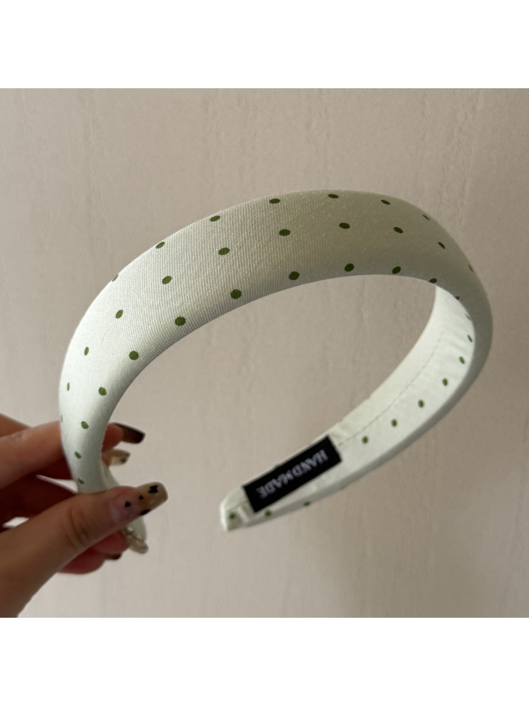 Gifty headband folded to show inner lining and stitching details