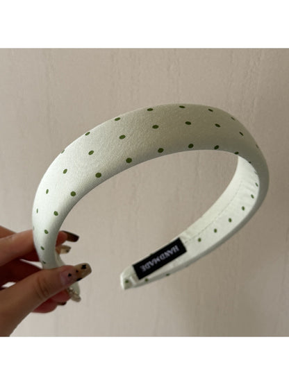 Gifty headband folded to show inner lining and stitching details