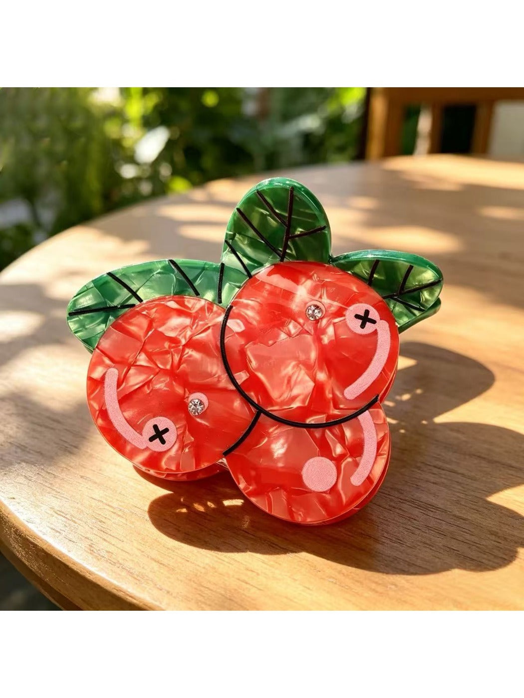 Close-up of Beau 3D fruit shape claw clip hinge and clasp mechanism