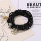 Lovra bracelet laid flat showing full length with leaf pendant and alternating beads
