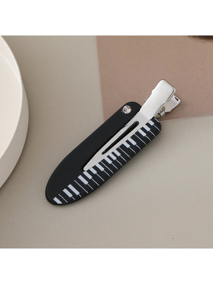 Beau - Music Themed Oval Hair Clip