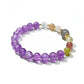 Lovra minimalist bracelet with amethyst and color block beads on a white background
