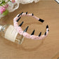 Gifty Sweet Polka Dot Headband packaging with branding visible