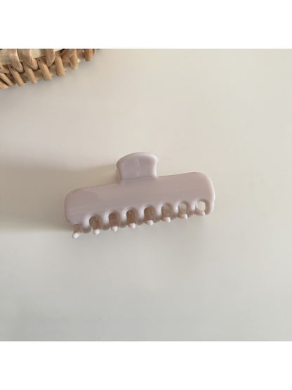Beau rectangular hair clip in pastel green displayed on white background
