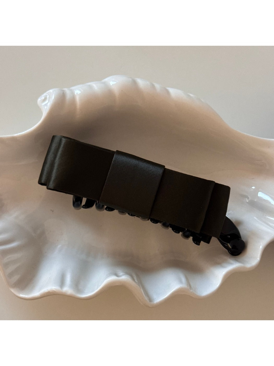 Beau vintage bow hair clip shown from multiple angles on neutral background